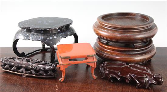 A Chinese ryukyuan lacquer ware stand and six other stands